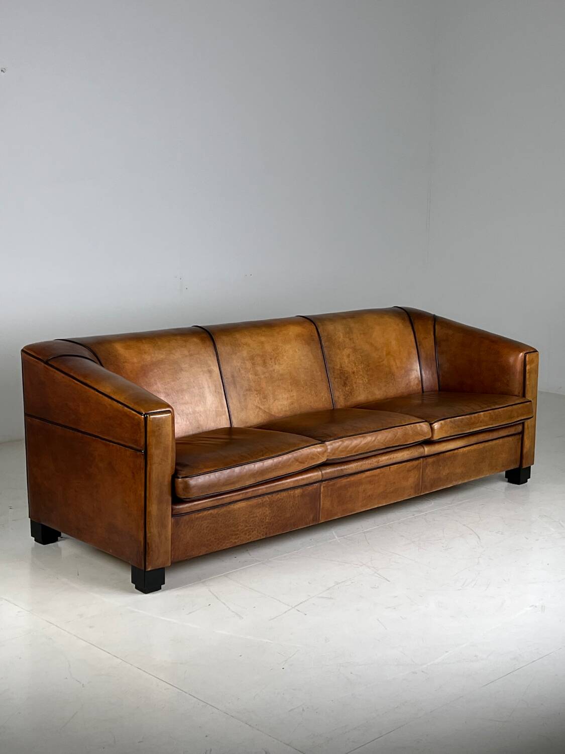 Art deco sofa sheep’s leather