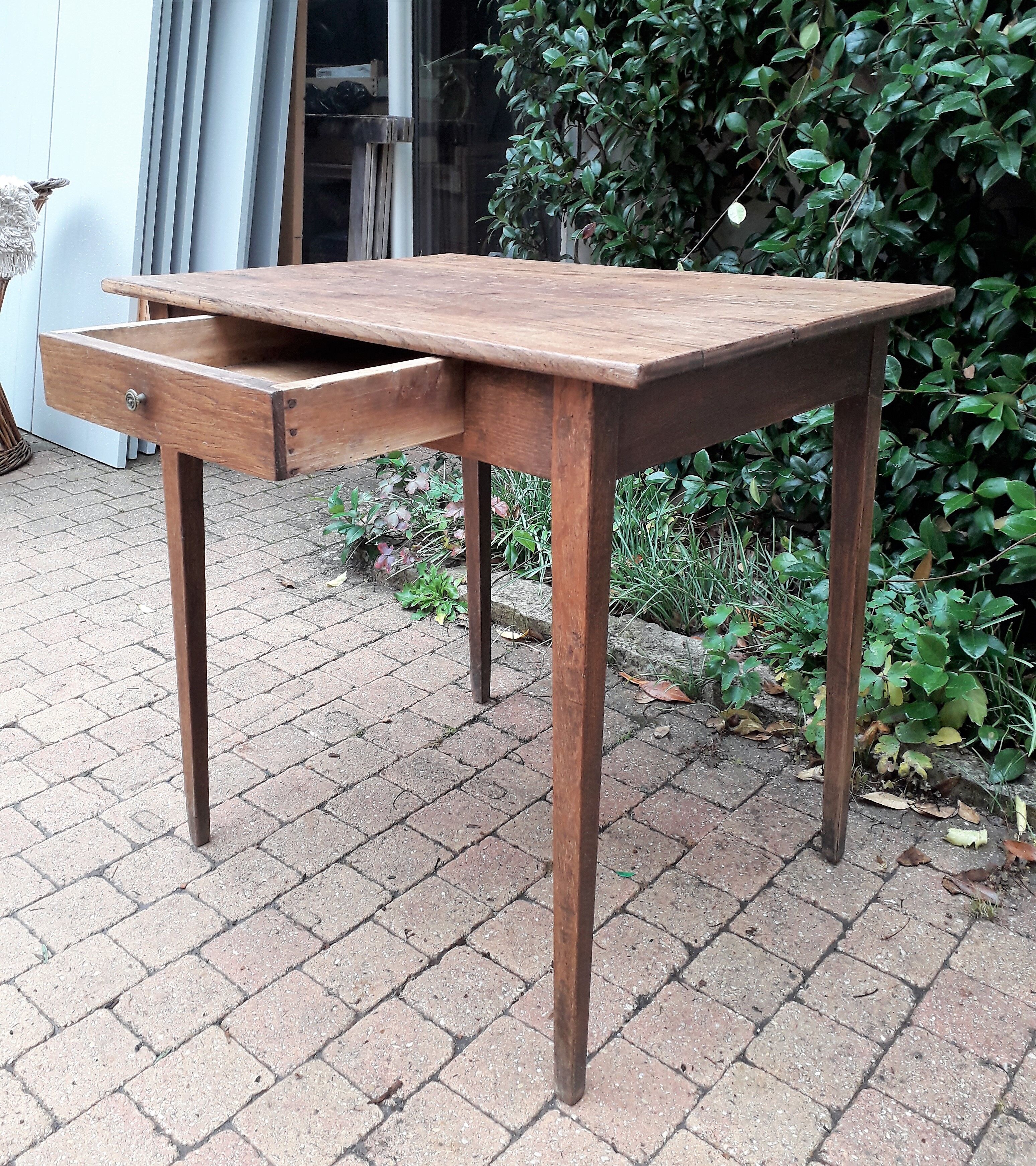 Old end table in oak