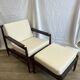 Scandinavian armchairs in solid teak with ottoman from the 1960s.