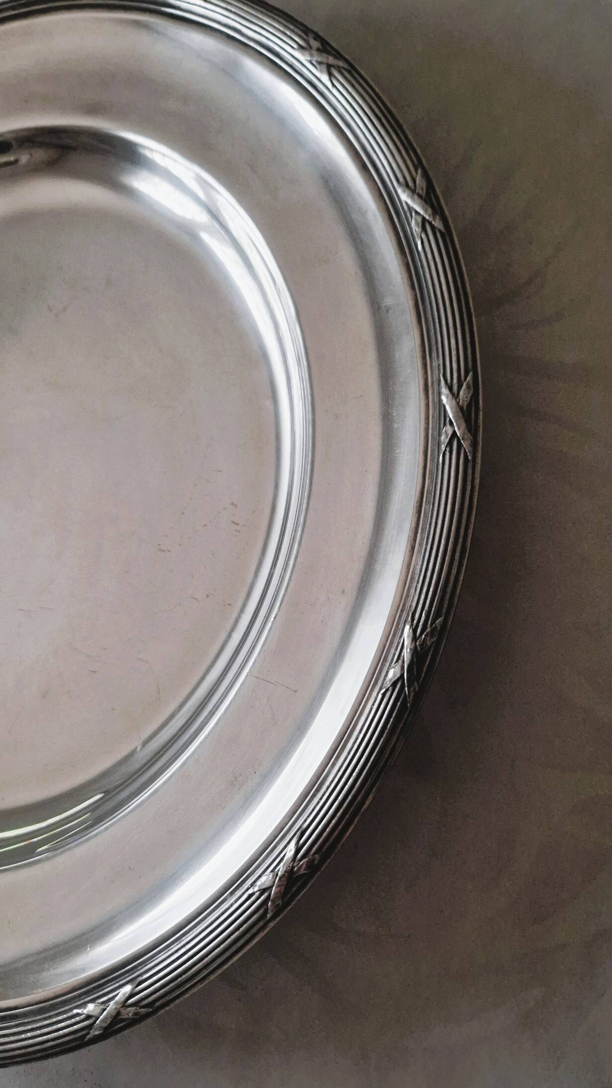 Round silver-plated metal serving dish by Cristofle