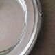 Round silver-plated metal serving dish by Cristofle