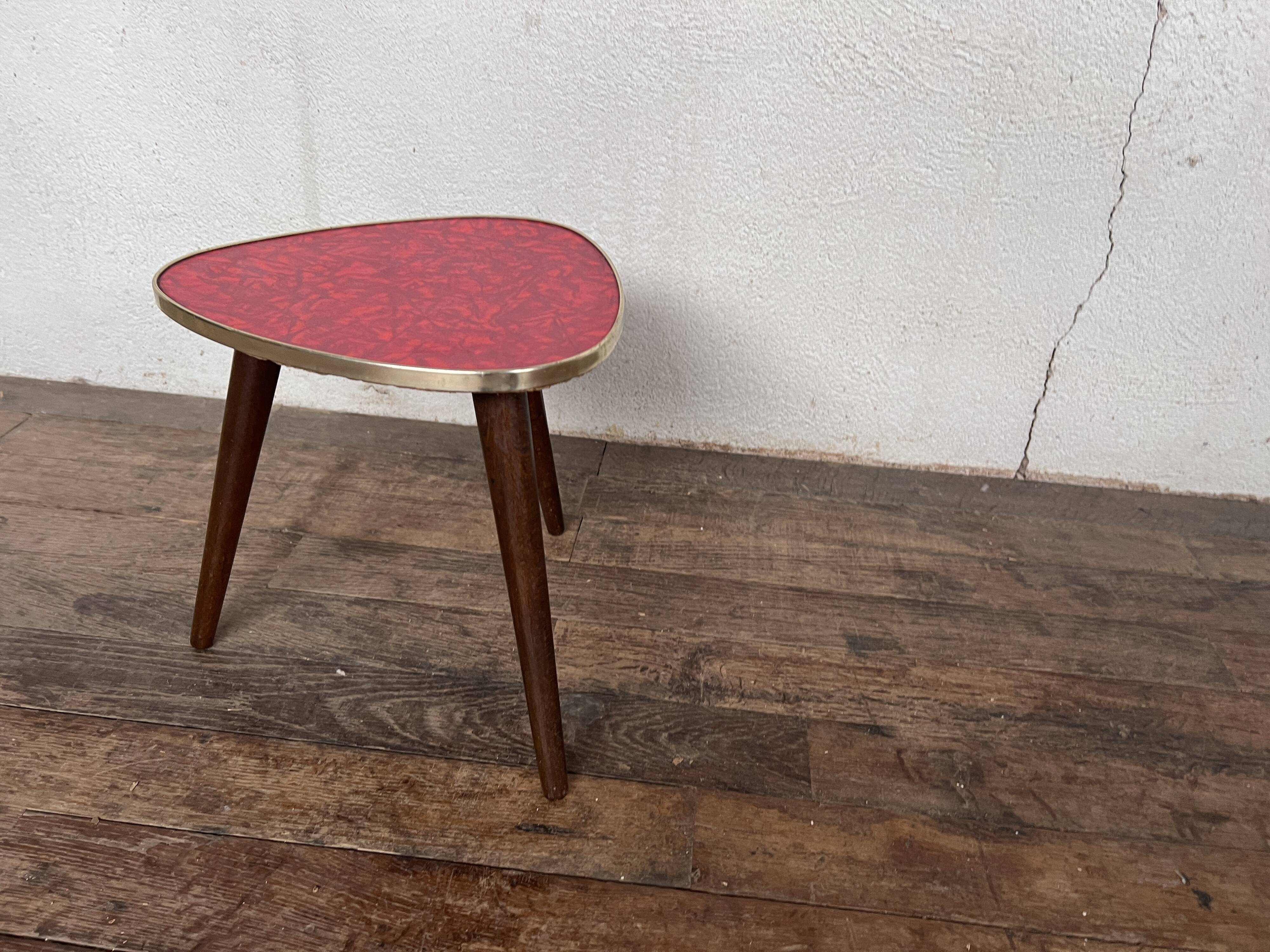 Triangular pedestal table small red table asymmetrical shape vintage tripod plant door