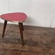 Triangular pedestal table small red table asymmetrical shape vintage tripod plant door