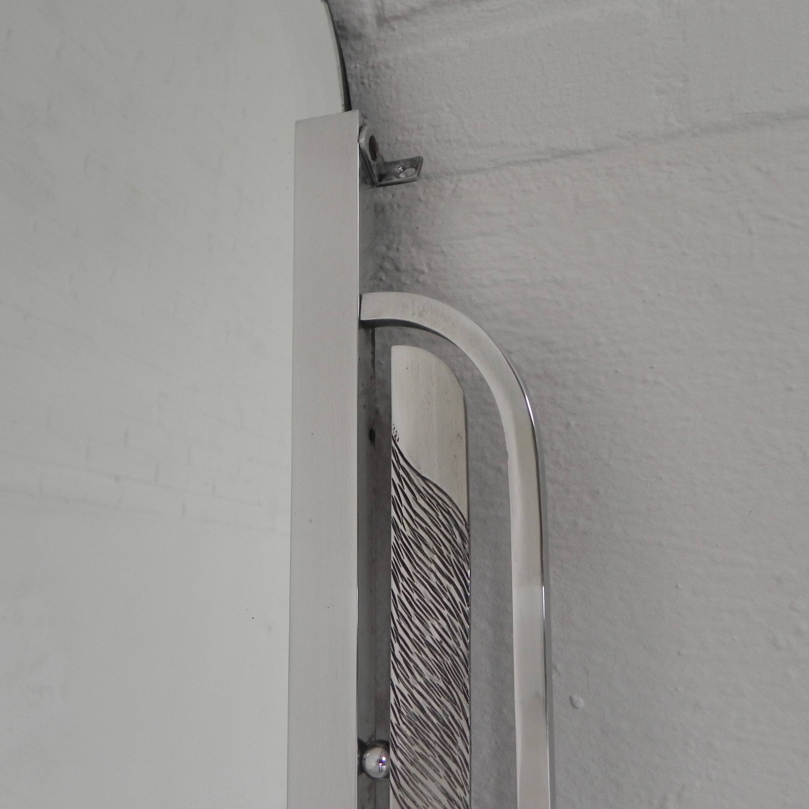 Art Deco mirror with faceted glass in aluminum frame, 1930s