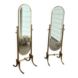 Pair of brass cheval mirrors in neoclassical style
