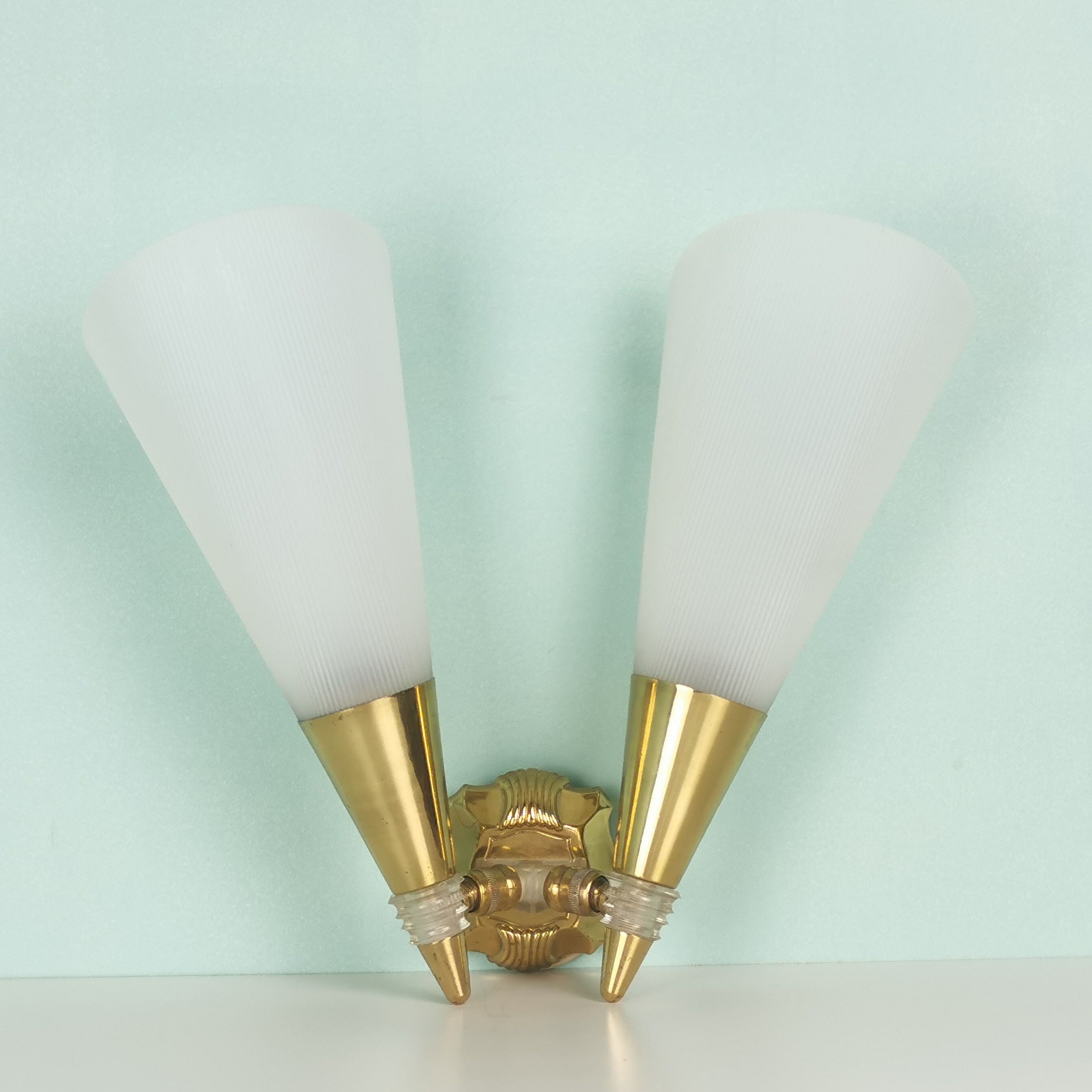 Applique double laiton