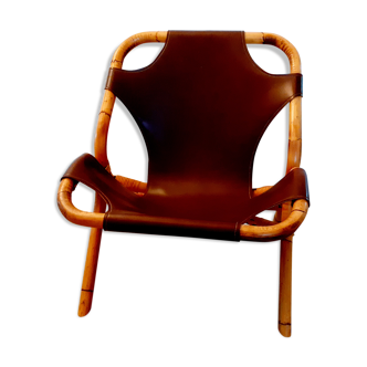 Fauteuil vintage en rotin et simili-cuir années 60