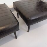 Set of 2 vintage modernist armchairs in black faux leather and metal.