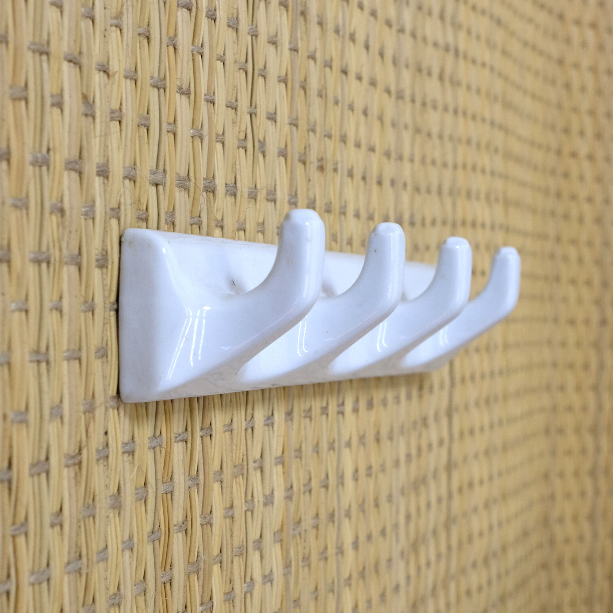 Tea towel holder or porcelain towel with 4 hooks.