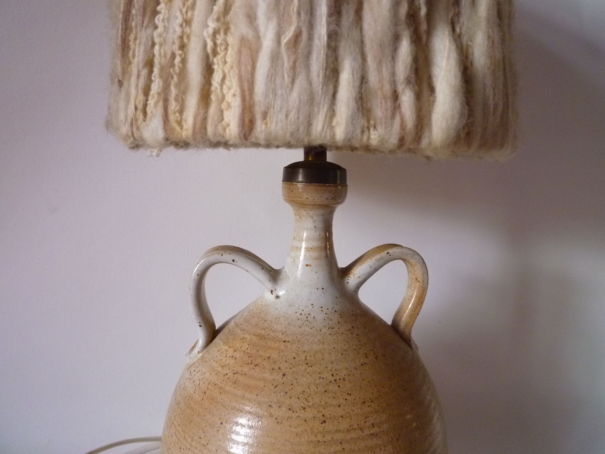 Lamp with sandstone handles