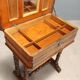 Antique sewing table in walnut and cherry wood, 19th century.