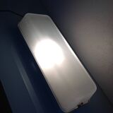 Rectangular porthole wall light in industrial/70s style frosted glass
