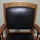 Fauteuil colonial en teck et cuir noir