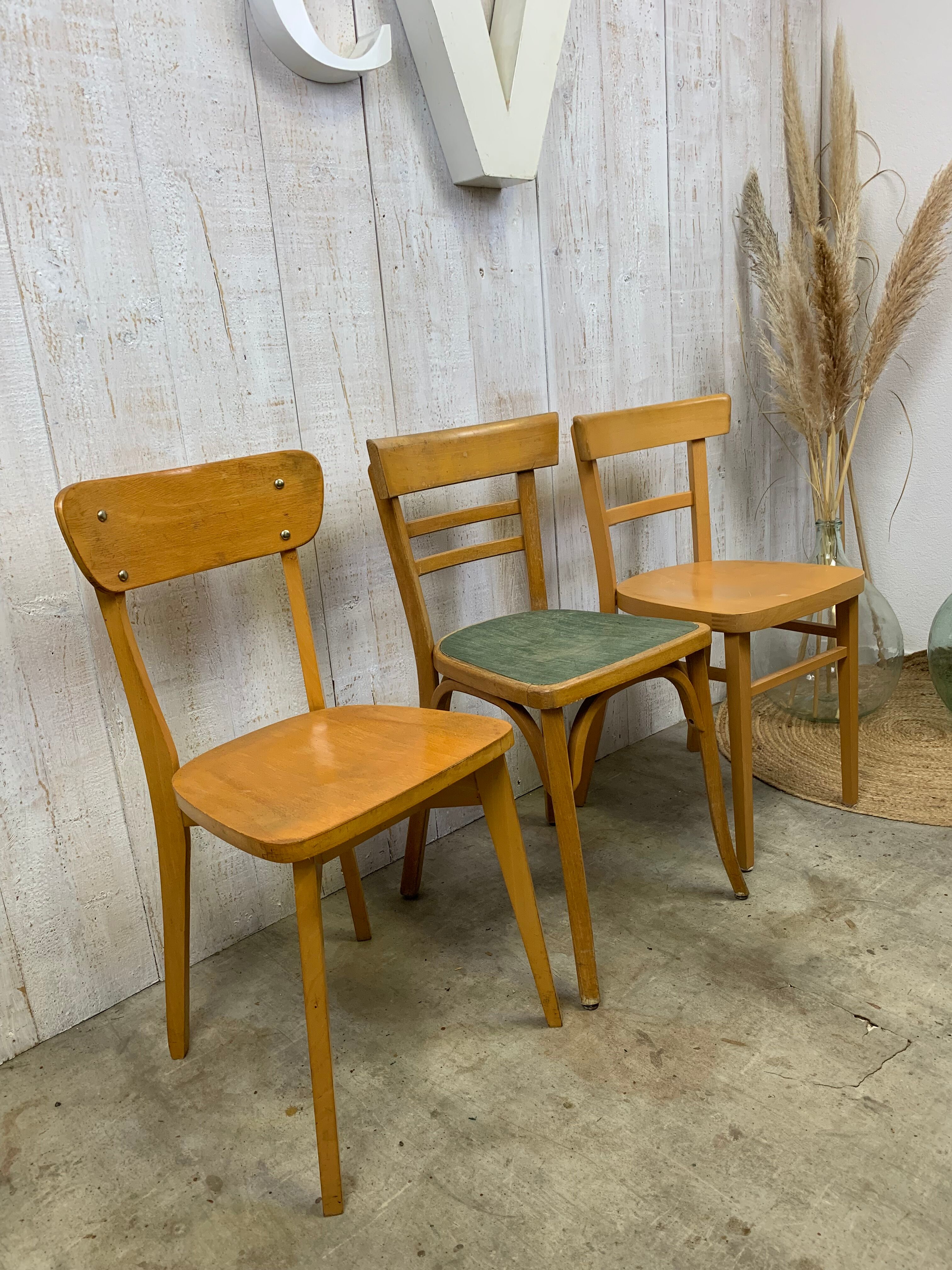 Lot 3 mismatched bistro chairs