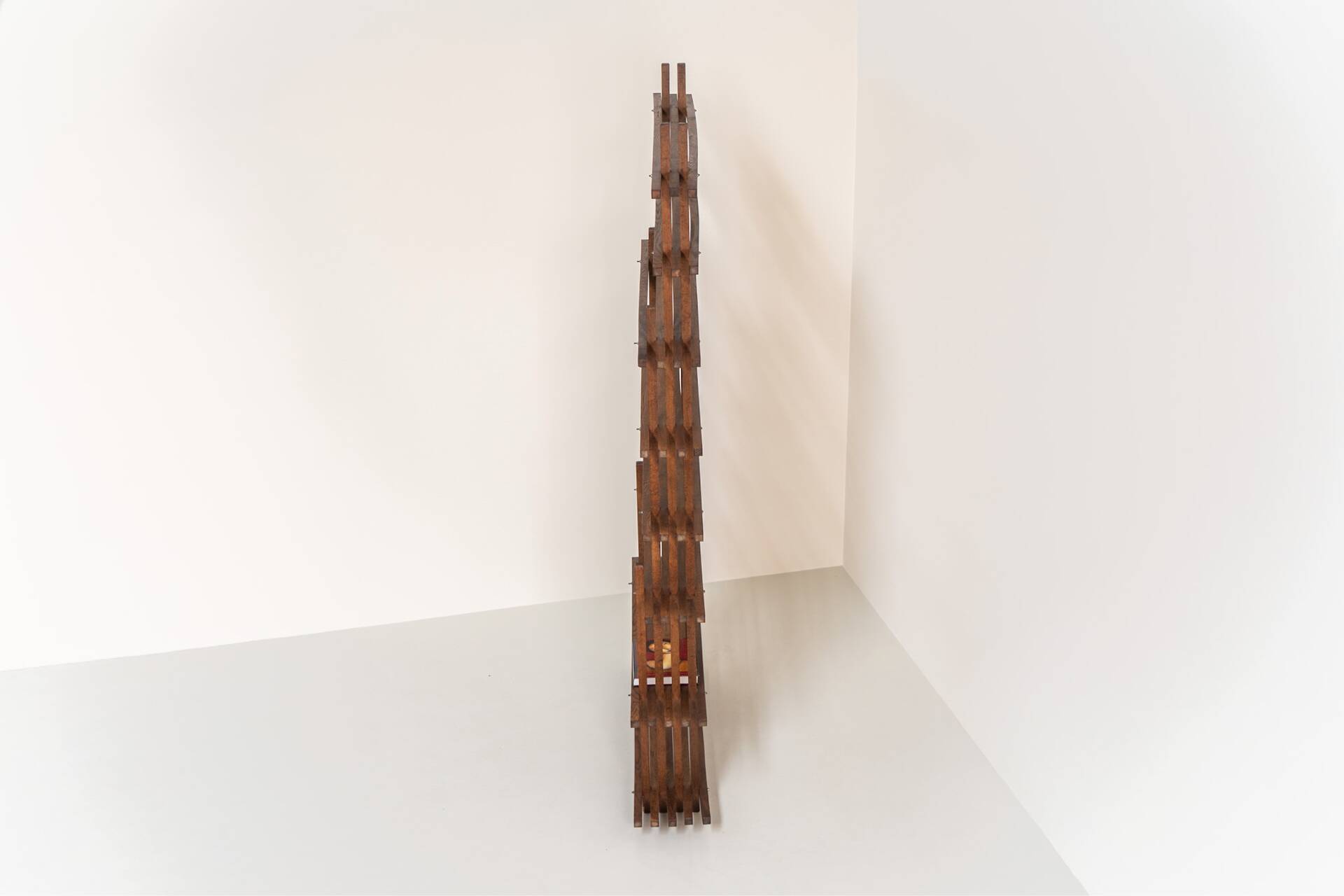 Sculptural wengé slat bookcase (Europe, 1960s).