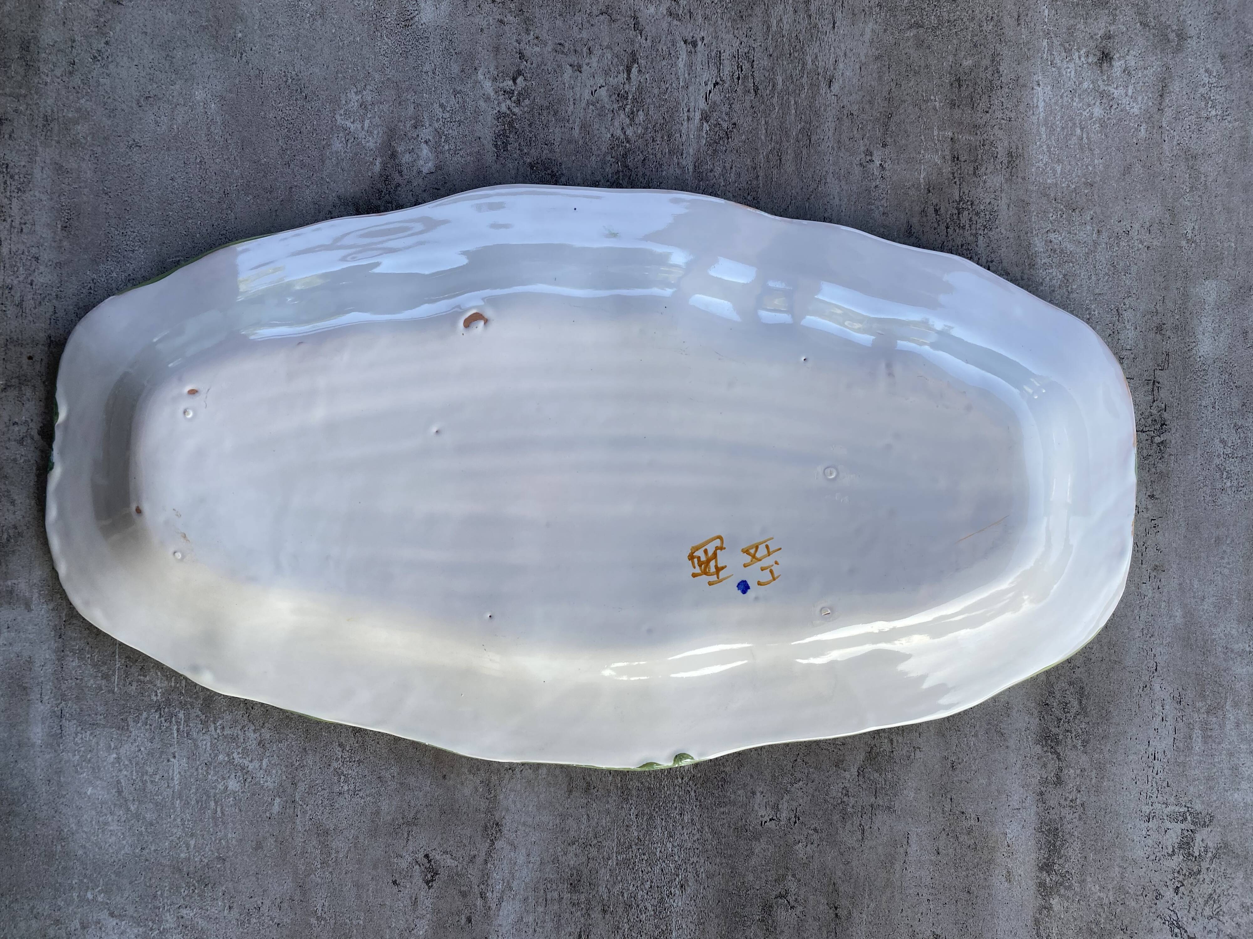 Very large decorative dish in Limoges earthenware