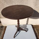 Small rustic antique tripod side table made of solid wood.