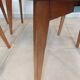 5 chairs in wood and black faux leather, Scandinavian style