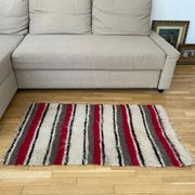 Set of two Romanian wool fluffy rugs with stripes made by hand