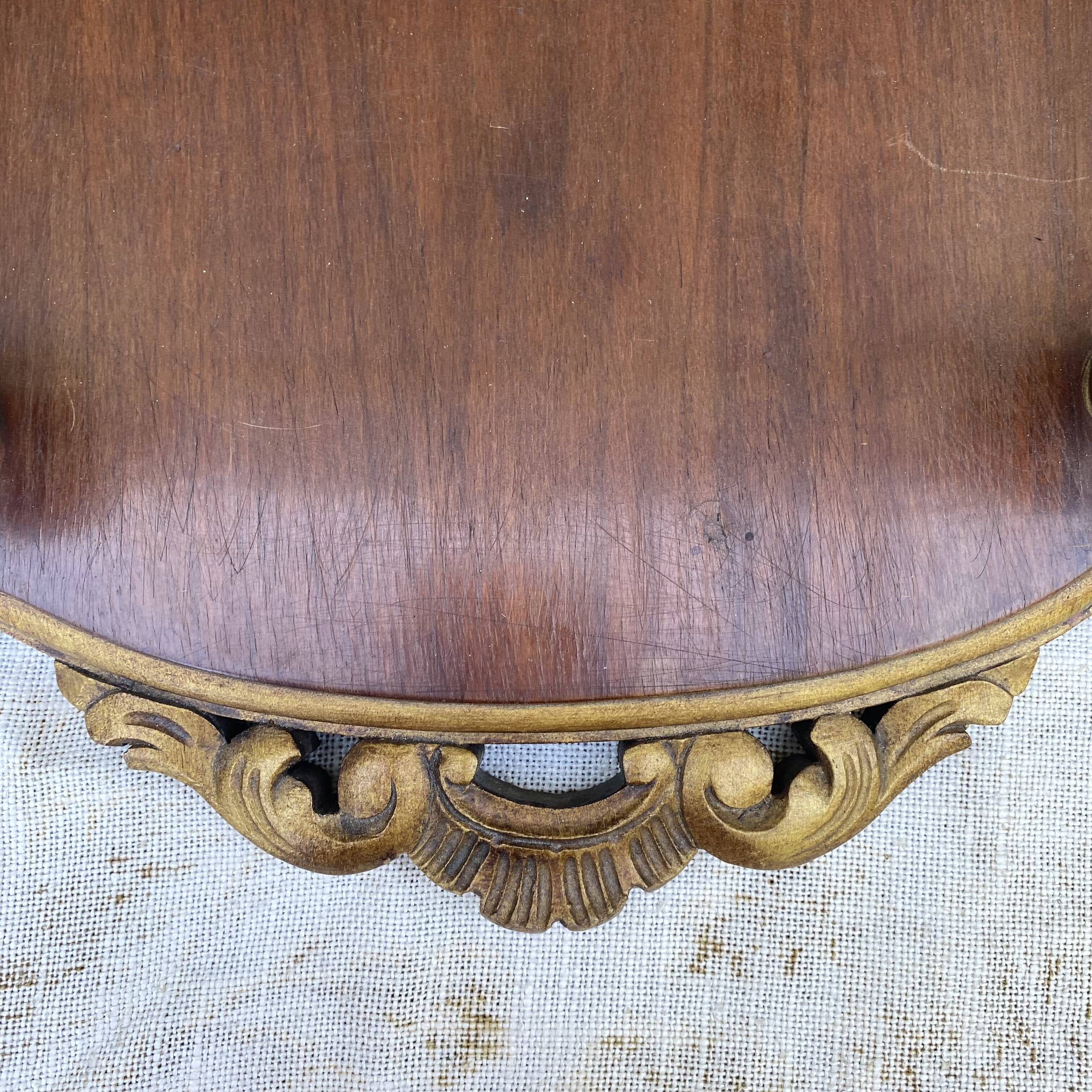 Coat rack and wall-mounted hat rack in an antique style.