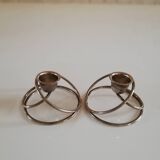 Pair of white metal candle holders