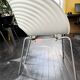 4 Tom Vac chairs designed by Ron Arad with a white round table of 110cm.