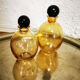 Duo of small amber bottles