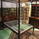 Four-poster bed in late 19th century mahogany