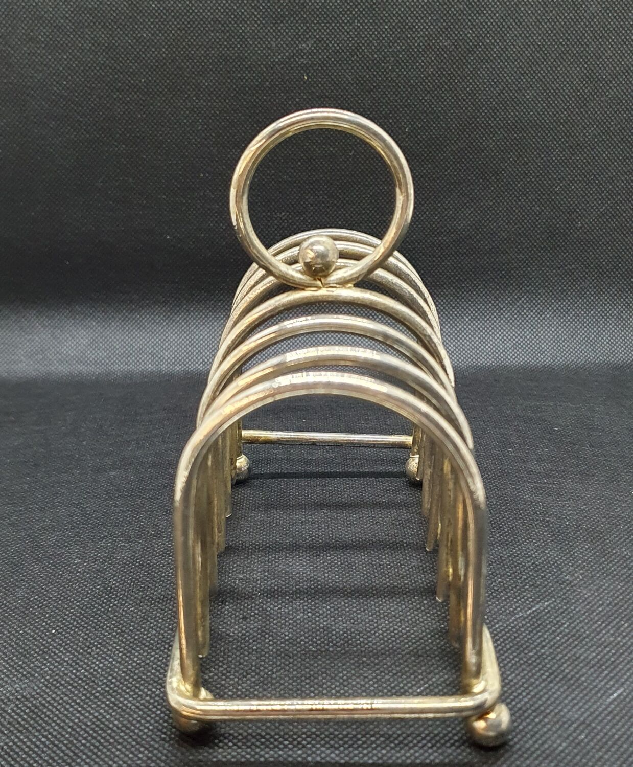 Toast holder in silver metal