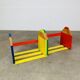 Modular wall-mounted pencil shelf in Pierre Sala style, for children.