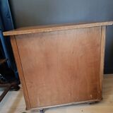 Vintage retractable swivel bar cabinet from the 1950s