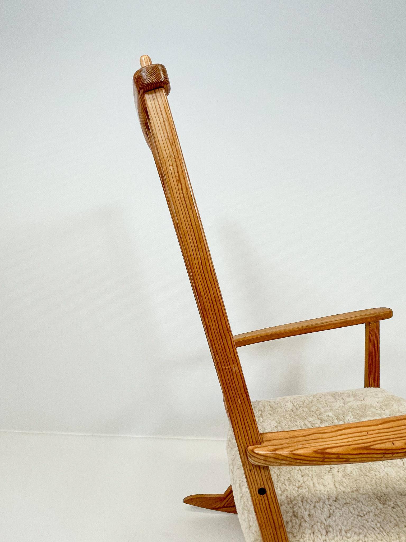 Mid-century rocking chair in pine and sheepskin by Yngve Ekström, Sweden.