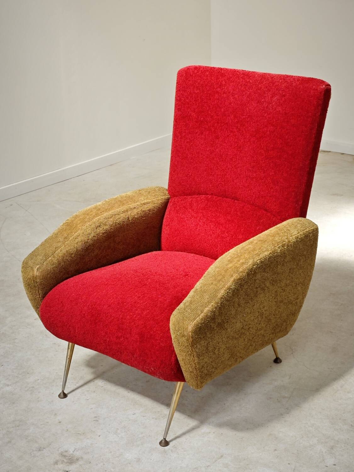 Red and mustard yellow fabric armchair in 1970s style