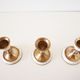 Lot of old candlesticks in brass and mother-of-pearl