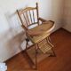 Chaise haute d'enfant , en bois , début 20ème
