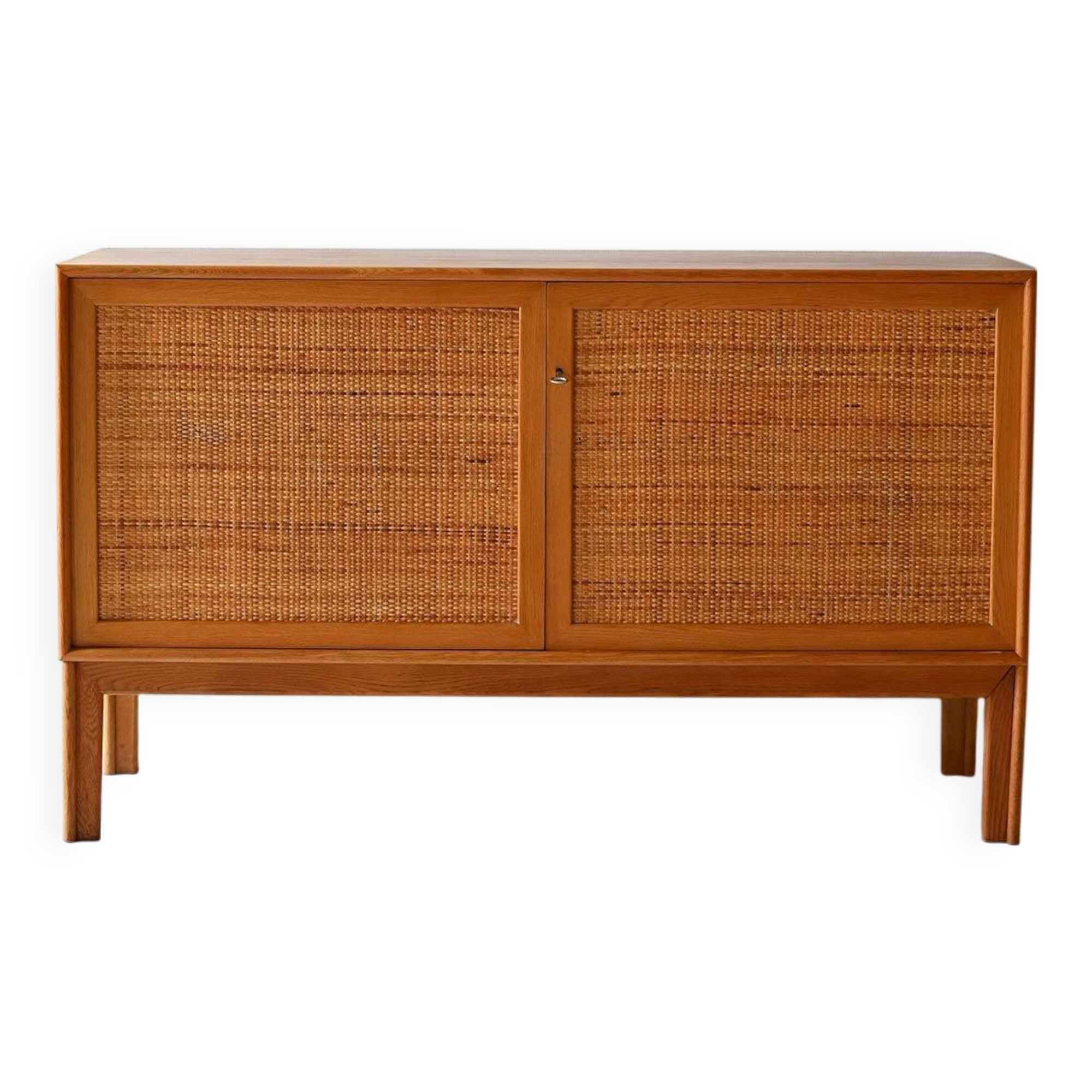 Scandinavian oak cabinet with woven rattan doors
