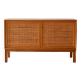 Scandinavian oak cabinet with woven rattan doors