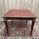 Table extensible style Louis XVI – Plateau cuir doré au petit fer – Bronze doré