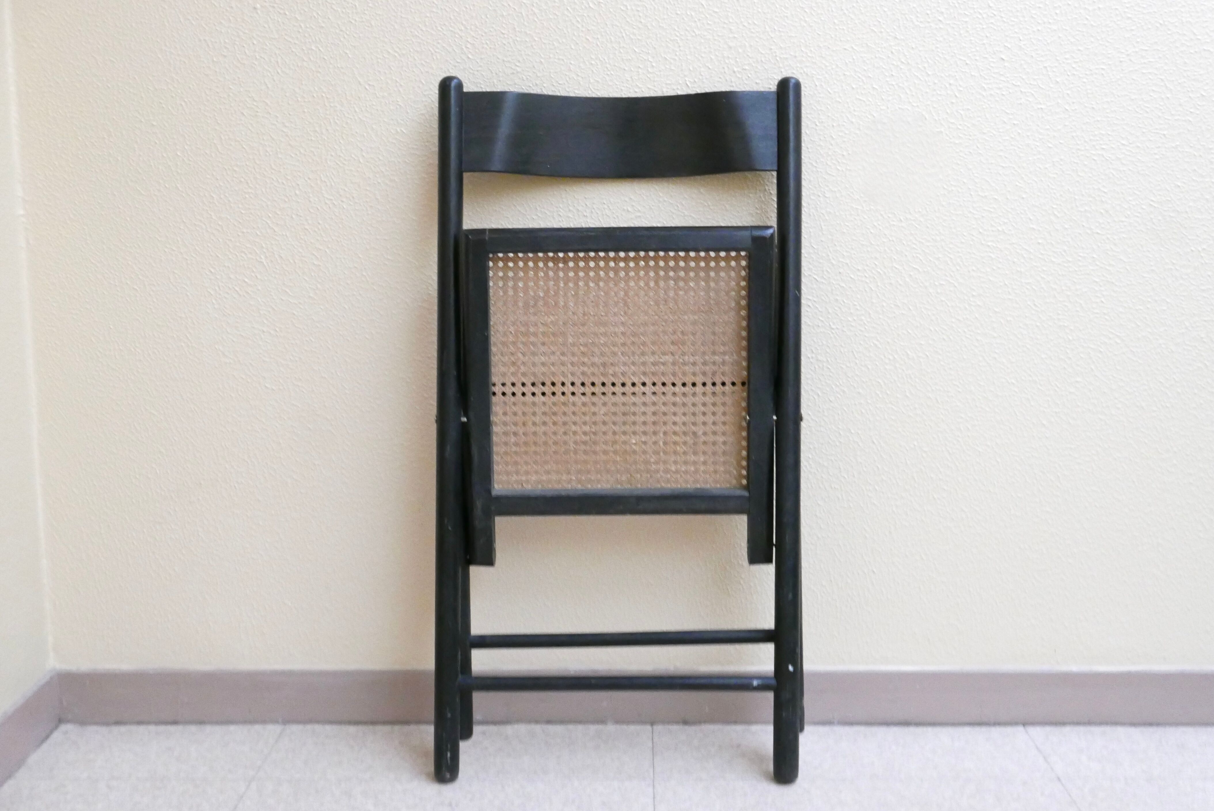 Black folding chair, 70s