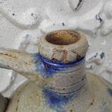 Old potiche jug in sandstone of Alsace