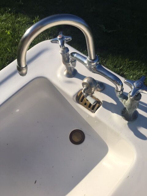 Old double sink with faucet