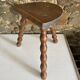 Low tripod stool with turned legs