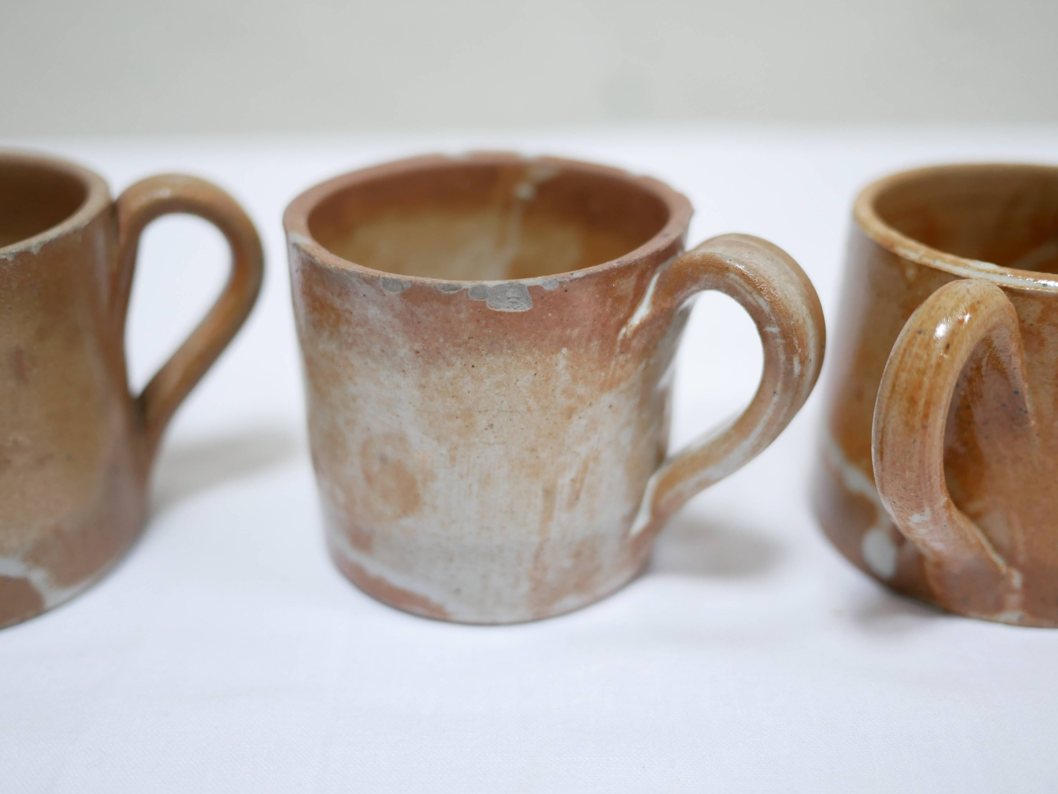 Series of 8 cups and vintage stoneware cups