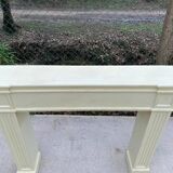 Fireplace surround with beige solid wood mantel