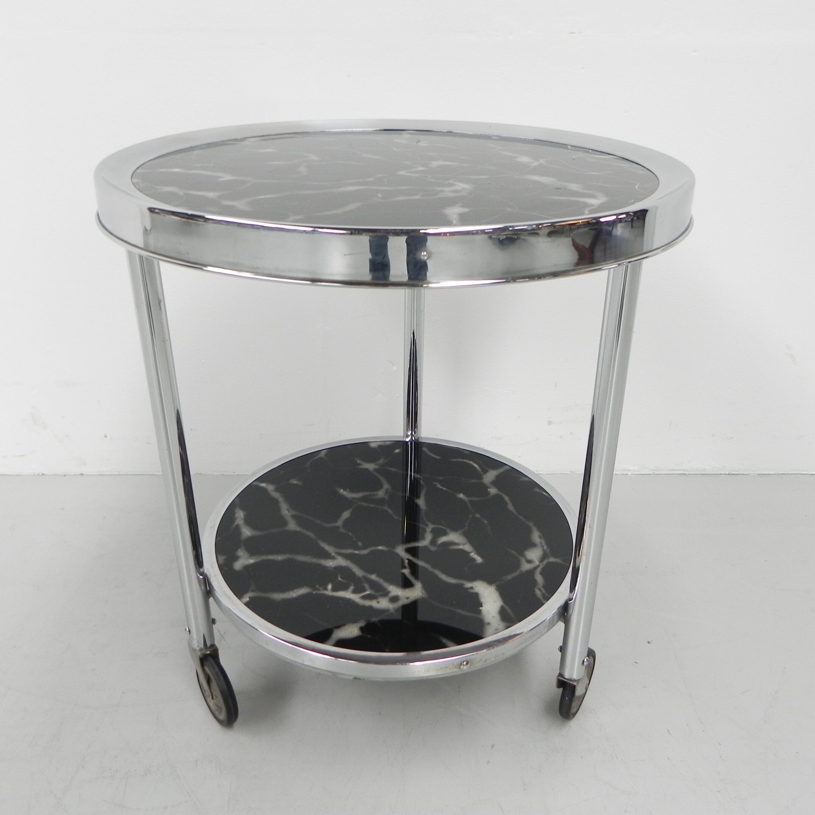 Art deco coffee table in bauhaus style with 2 glass tops and castors