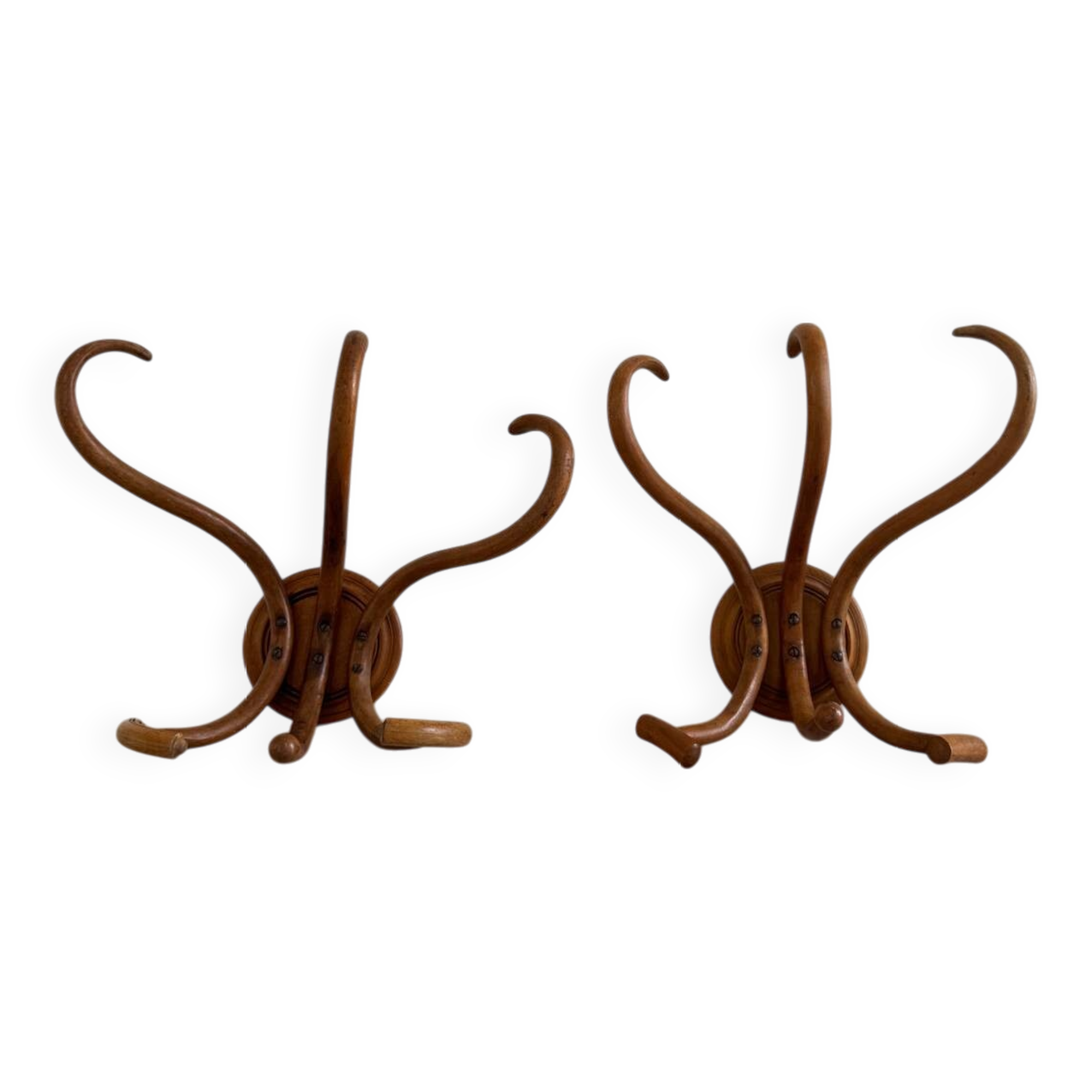 Pair of curved wooden coat racks or hooks from the 1900s