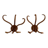 Pair of curved wooden coat racks or hooks from the 1900s