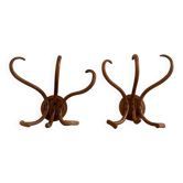 Pair of curved wooden coat racks or hooks from the 1900s