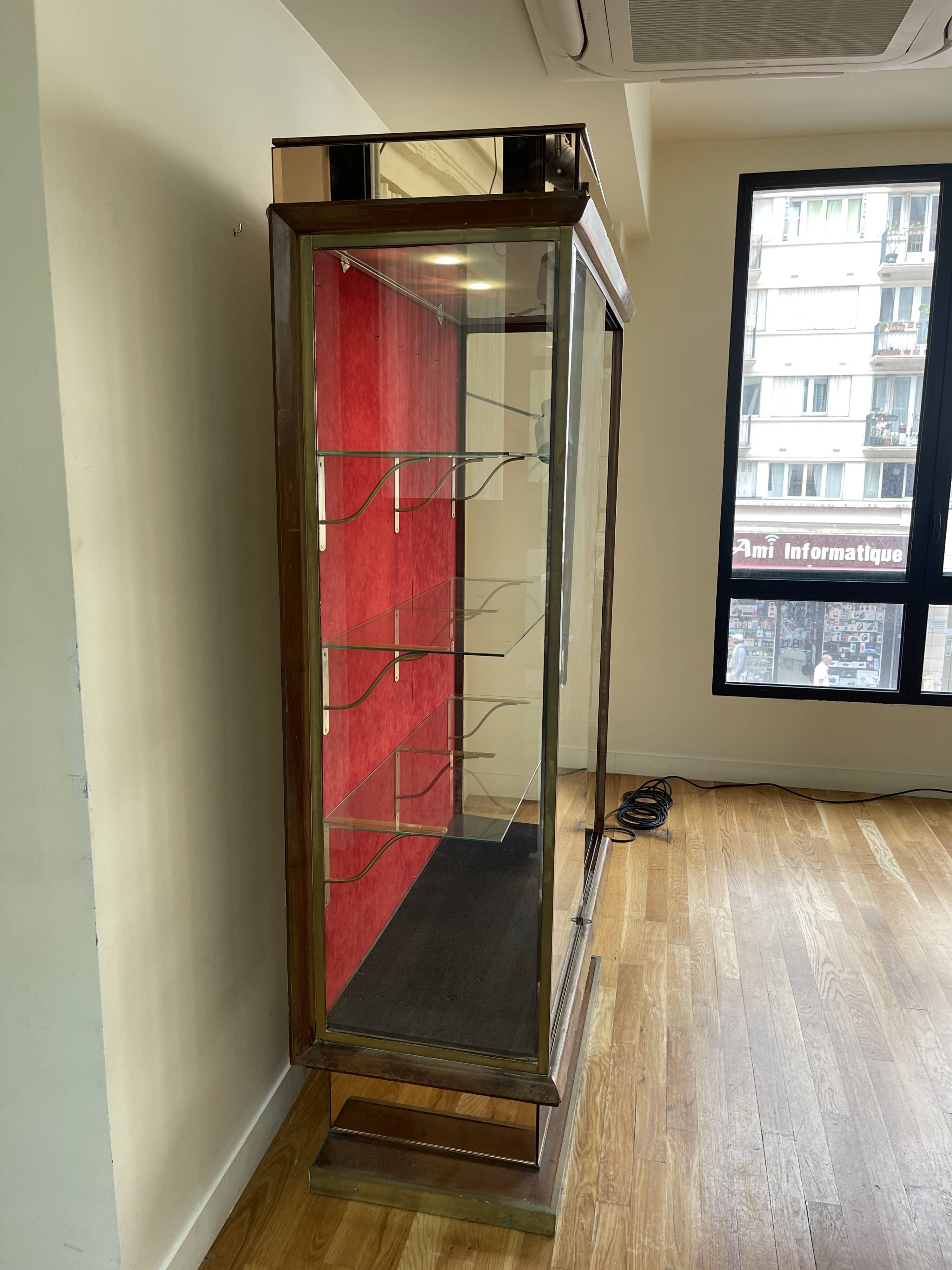 Brass display case from the Lutetia hotel with integrated lighting.