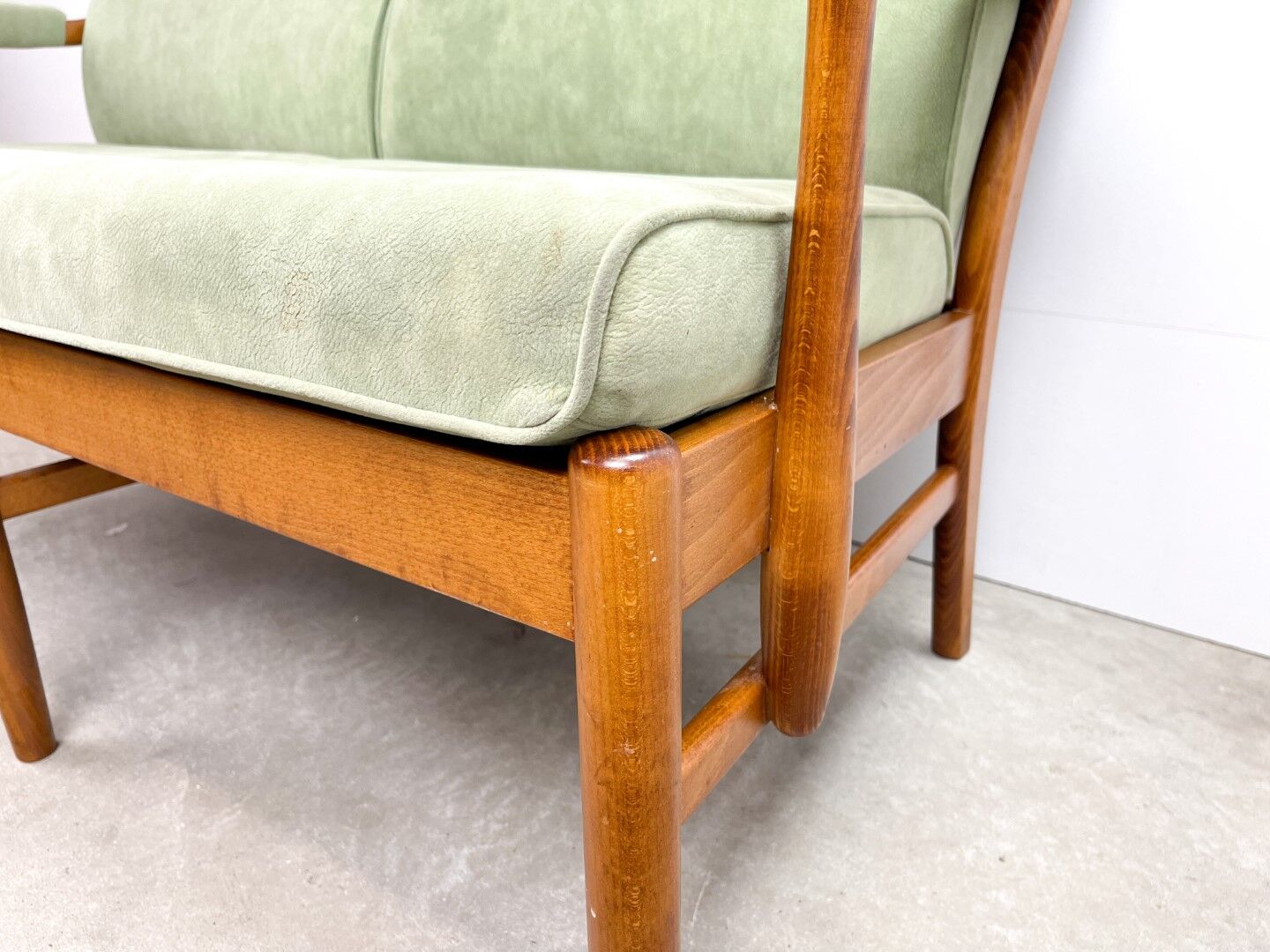Two-seater sofa from the sixties with green upholstery